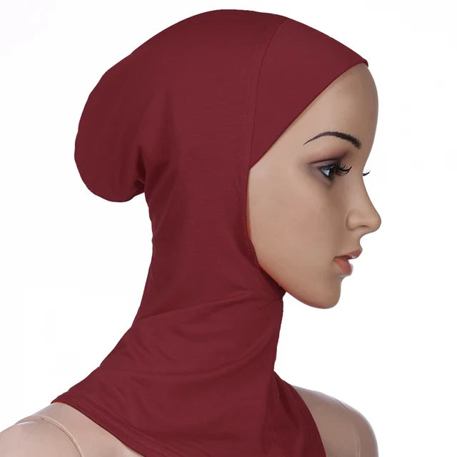 Breathable athletic underscarf hijab for women in a Red by AmoorFemme. Made from sweat-wicking material for comfort during workouts.