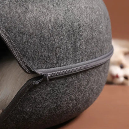 Large, cozy cat tunnel bed by AmoorPet. Features a spacious tunnel for playing and a soft, washable bed for relaxing. Sturdy zipper for easy access and cleaning.