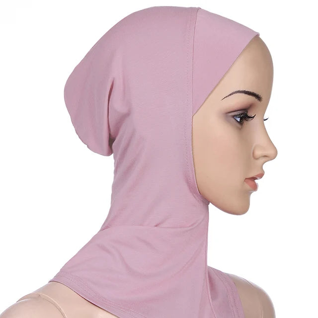 Breathable athletic underscarf hijab for women in a Pink by AmoorFemme. Made from sweat-wicking material for comfort during workouts.