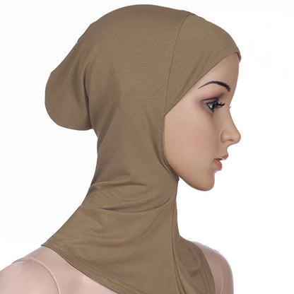 Breathable athletic underscarf hijab for women in a Creme by AmoorFemme. Made from sweat-wicking material for comfort during workouts.