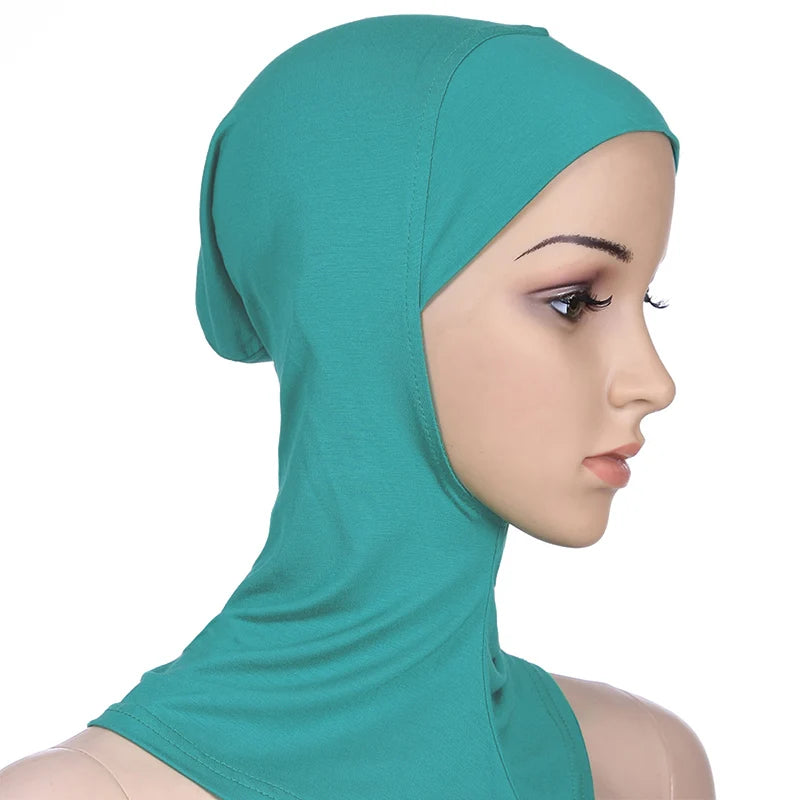 Breathable athletic underscarf hijab for women in a Green by AmoorFemme. Made from sweat-wicking material for comfort during workouts.