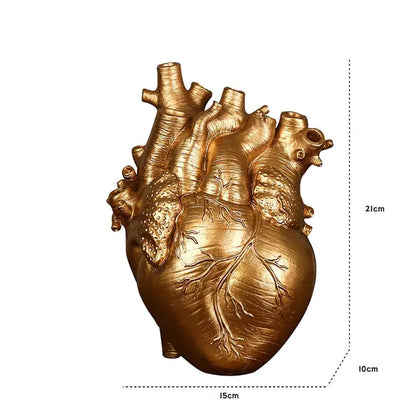 AmoorCity Heart-Shaped Table Vase. Ceramic vase in a heart shape. Perfect for adding a romantic touch to any tabletop arrangement.