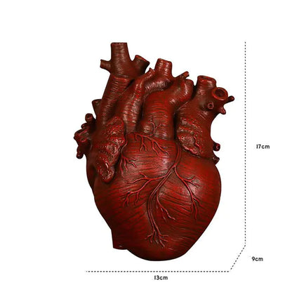 AmoorCity Heart-Shaped Table Vase. Ceramic vase in a heart shape. Perfect for adding a romantic touch to any tabletop arrangement.