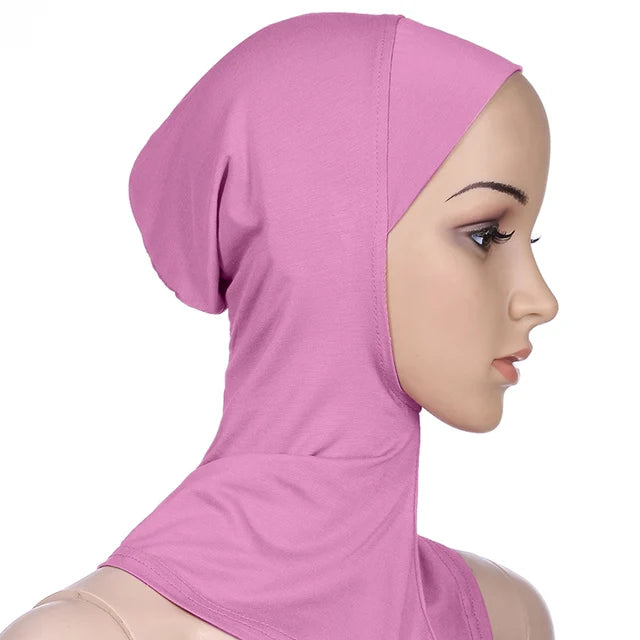 Breathable athletic underscarf hijab for women in a Pink by AmoorFemme. Made from sweat-wicking material for comfort during workouts.